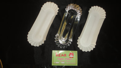 white and silver paper tray or plates for sausages and kikiams