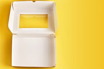 Interior shot of a white pastry box with window and reversible